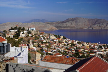panoramic view over symi village and pedi bay