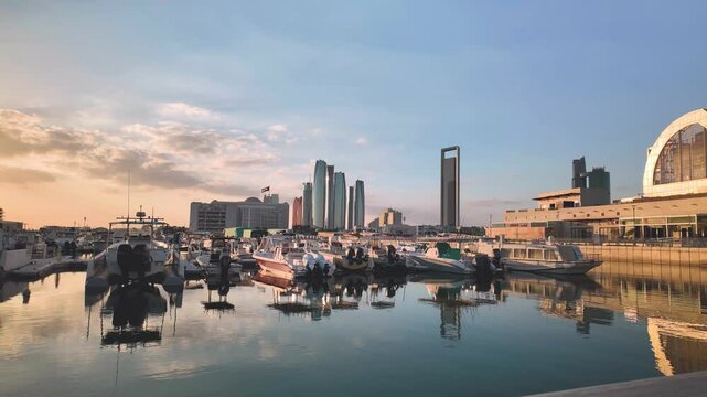 Abu Dhabi Modern Skyline Reflected in Al Bateen Marina. UAE capital city