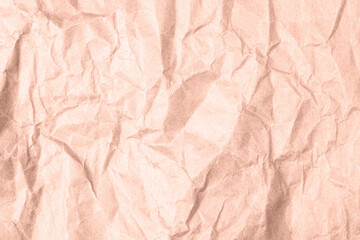 Light brown crumpled kraft paper texture, background. Demonstrating color of the year 2025 - Mocha Mousse