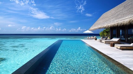 Fototapeta premium Tranquil Infinity Pool Overlooking Tropical Ocean Paradise