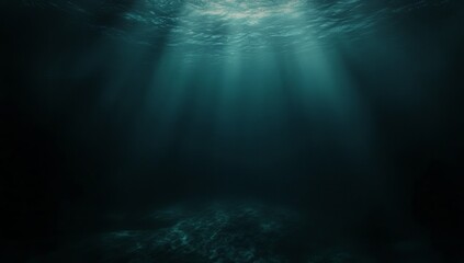 Mysterious underwater scene with sunbeams piercing the deep dark ocean.