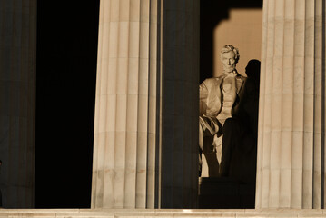 Lincoln statue in high contrast morning light at Lincoln Memorial - Washington D.C. United States...