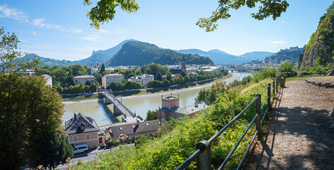 Fototapeta premium Viewpoint on the Monchsberg with a view of the Hohensalzburg Fortress and the Salzach river