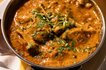 Karahi Chicken is a popular dish from the South Asia. Chicken is slow cooked with tomatoes and spices.