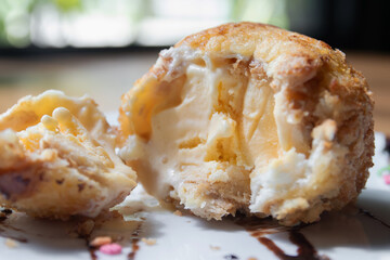 Delicious fried dessert with ice-cream filling.
