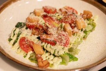 Fresh salad with vegetables and cheese topping.