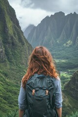 Naklejka premium Woman looking over valley
