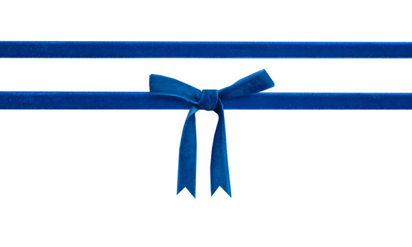 Blue velvet bow and ribbon isolated on white. Gift box decor, Christmas design element.