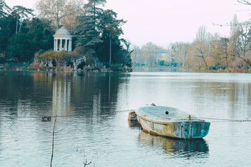Exquisite view of the rotunda and artificial grotto at ile de Reuilly by Lake Daumesnil with a...