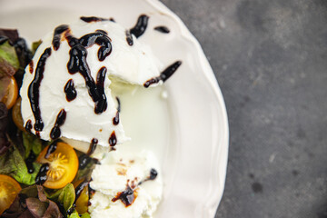 burrata salad fresh tasty food dish Delicious gourmet food background on the table rustic food top view copy space keto and paleo diet Vegetarian and vegan food