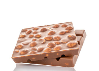 Two bars of dark chocolate with hazelnuts, close-up, isolated on a white background.