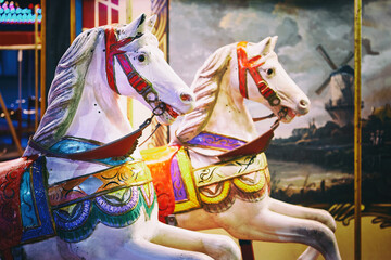 Horses on a children carousel © Sergey Ryzhov