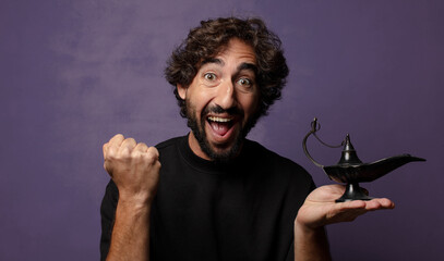 young bearded crazy man  with a genious lamp