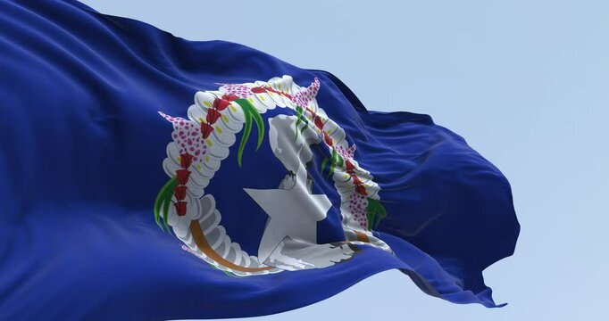 Close-up of Northern Mariana Islands flag waving in the wind on a clear day