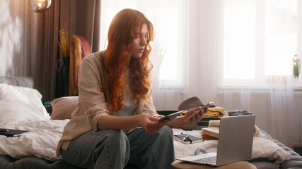 Caucasian woman girl female at bedroom at home bed order hotel mobile phone smartphone calling talk...