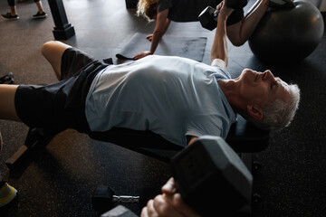Active Seniors Lifting Weights at the Community Gym