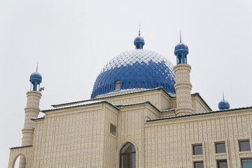 Beautiful Muslim mosque in blue skies and grass