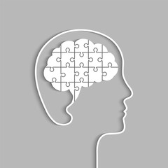 Head and brain made of jigsaw puzzle pieces. Complete and whole human mind concept. Papercut art, vector illustration.