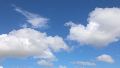 white clouds in the blue sky, ideal as a simple background of nature