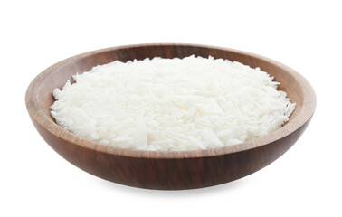 Soy wax in wooden bowl isolated on white