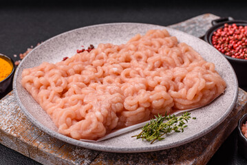 Raw minced chicken with salt, spices and herbs