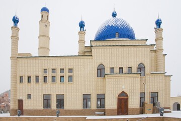 Beautiful Muslim mosque in blue skies and grass