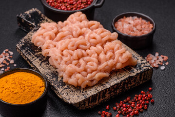 Raw minced chicken with salt, spices and herbs