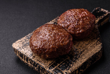 Beef burger patties with salt, spices and herbs