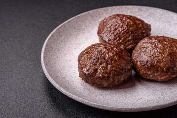 Beef burger patties with salt, spices and herbs