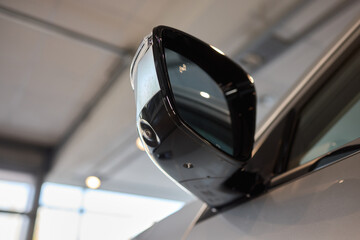 Introducing the modern car side mirror with integrated tech for improved functionality and style