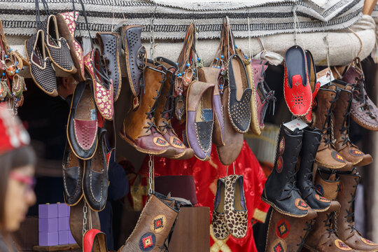 Turkish handmade leather footwear at a market. Istanbul - 11 May,2018