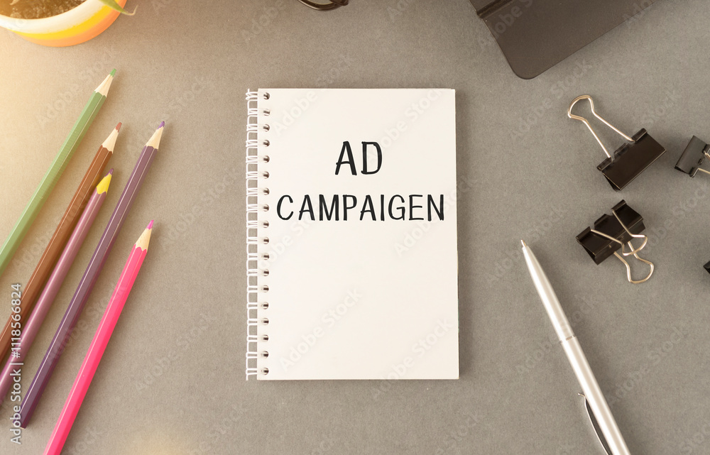 Poster notebook with toolls and notes about ad campaign