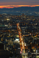 A Stunning Sunset Over the Osaka Cityscape at Dusk