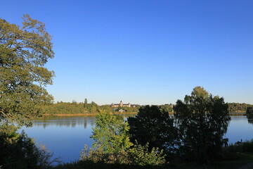 Swedish nature in early autumn one sunny day. Swedish building called naturhistoriska riksmuseet. Translated in english to the National Museum of Natural History.