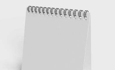 white paper desk calendar on white background for mockup