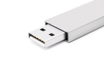 Close-up of a USB thumb drive with a metallic finish, on a white background