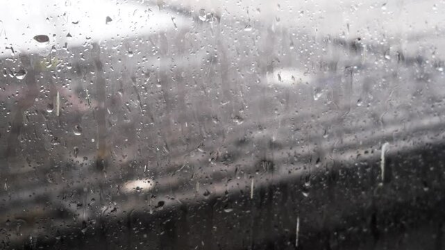 Rain Drops Falling down on apartment roof, dirty window glass, footage of Rain on Window Sky Drops, Close up Slow Rain, Rainy and raining mood, gloomy moods