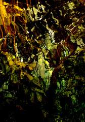 abstract wavy  gold and green reflections on water