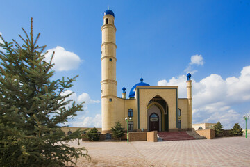 Beautiful Muslim mosque in blue skies and grass