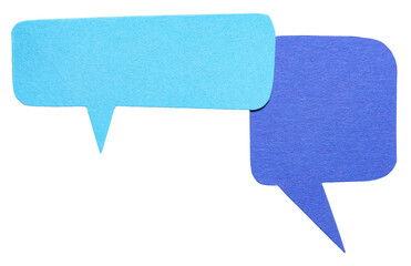 Two blue blank cut out cardboard paper speech bubbles with rough edges and copy space for text on...