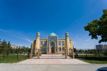 Beautiful Muslim mosque in blue skies and grass