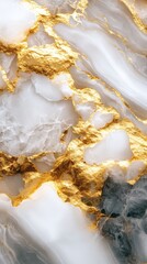 Golden Veins in Marble: A captivating close-up of polished white marble, punctuated by shimmering veins of gold, creating a luxurious and textured background.