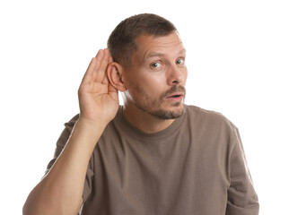 Man showing hand to ear gesture on white background