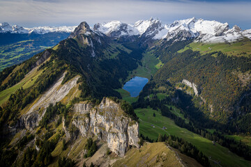 swiss mountains in alpstein with lake from above