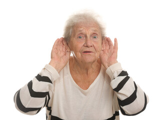 Senior woman showing hand to ear gesture on white background