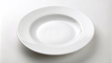 A white plate placed on a white surface,  highlighting a clean and modern visual appeal.