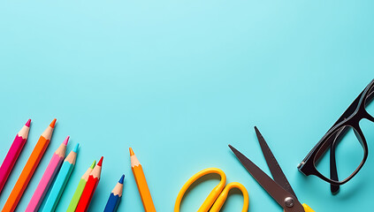 Colorful educational supplies including pens pencils scissors and glasses sit on a pastel blue background waiting for use with plenty of space._00001_