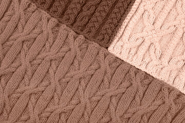 Demonstrating the colors of 2025 - Mocha Mousse. Knitted abstract background in three shades in trendy colors 2025. Large knitted blanket or sweater with pattern. Color concept.