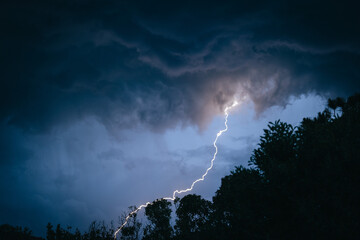  Thunderstorm Clouds with Striking Lightning: Dramatic Weather Phenomenon. Dark Clouds, Lightning,...