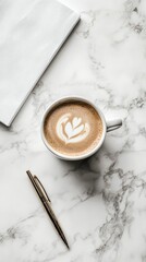 Morning Coffee Inspiration: Latte Art, Notebook, and Pen on Marble 